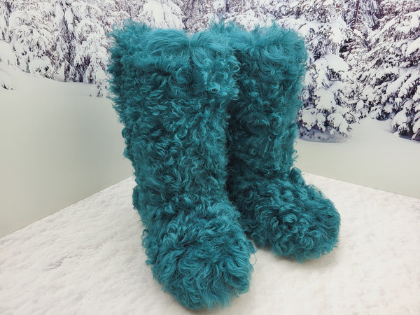 Blue-green curly fur boots