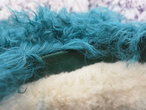 Blue-green curly fur boots