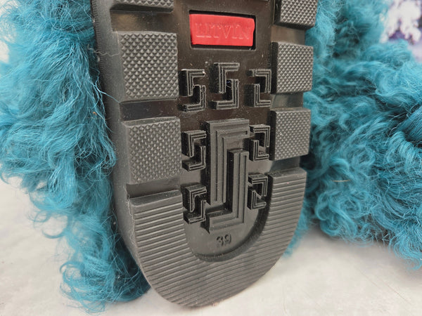 Blue-green curly fur boots