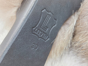 Raccoon fur slippers