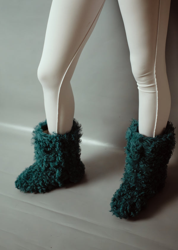 Blue-green curly fur boots